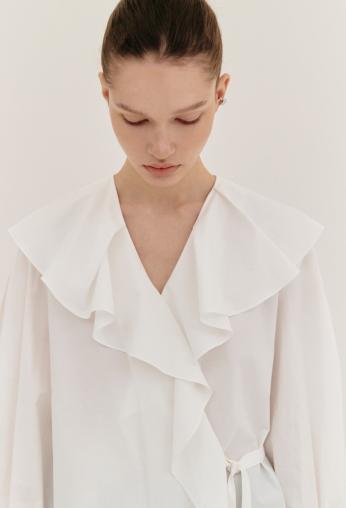 Ruffled Wrap Blouse In Ivory