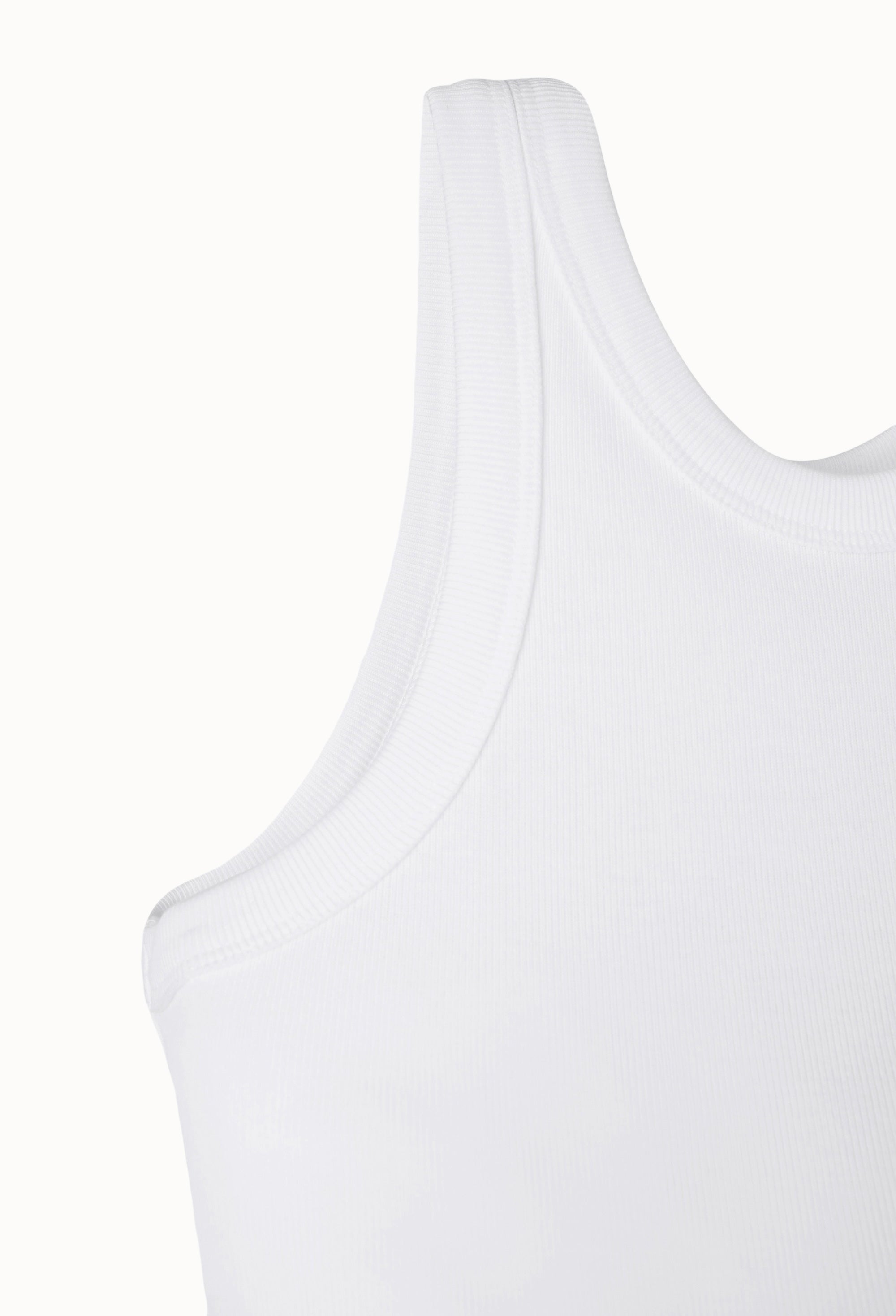 Curved Sleeveless Top In White