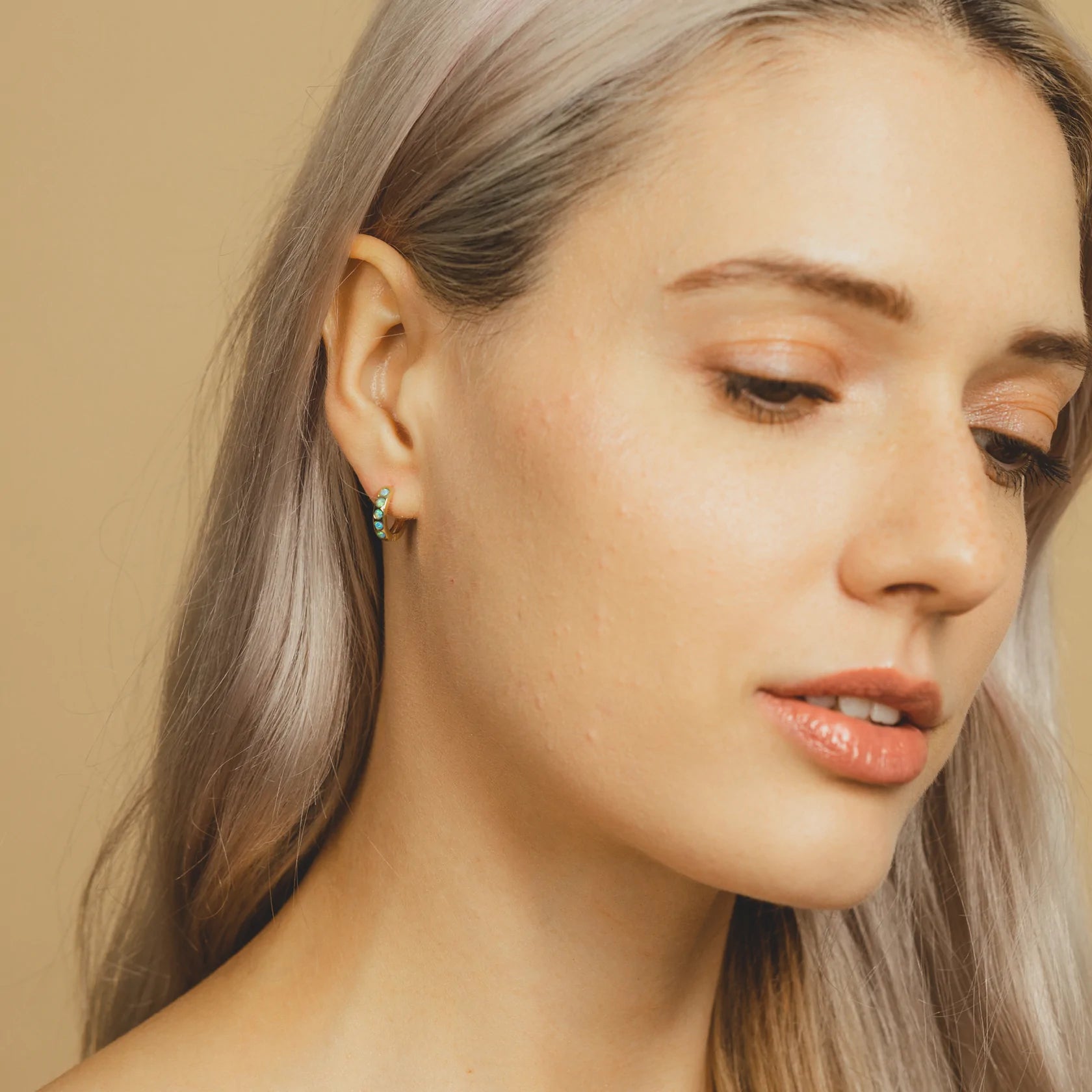 Dainty opal Huggies hoop earrings SHE0701